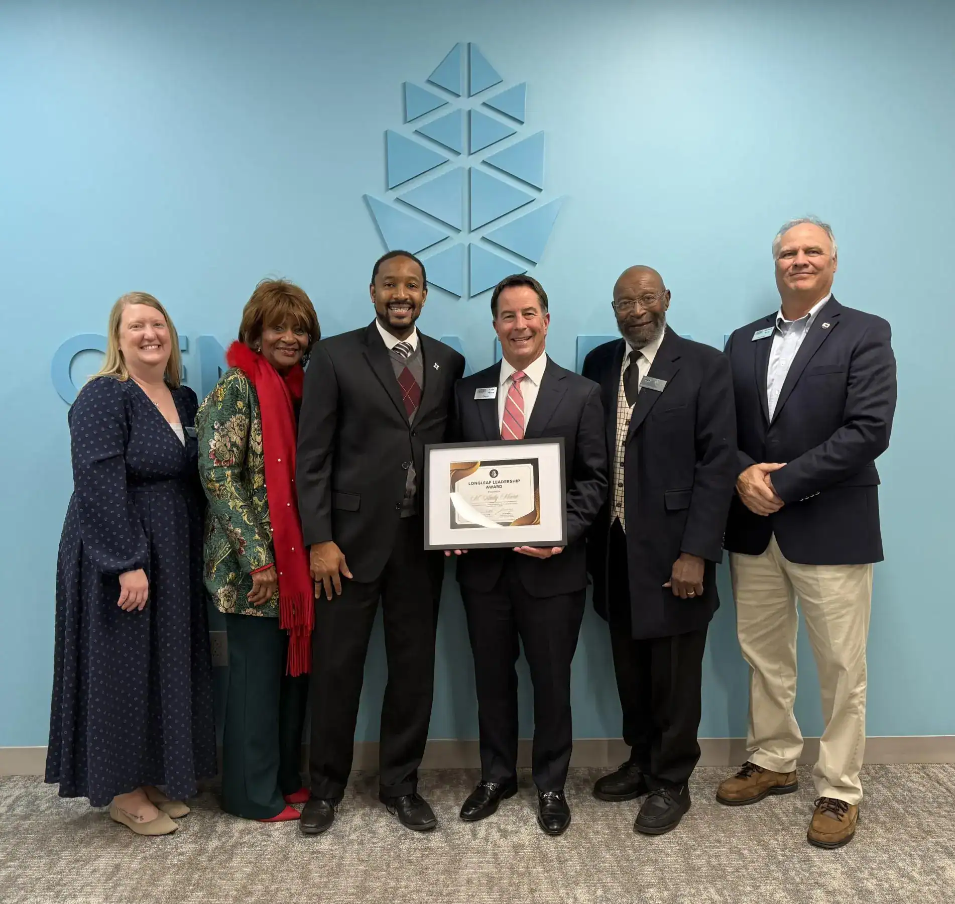 Smithfield Mayor Andy Moore with town officials and CPRC Board Chair Byron McAllister at the 2025 Golden Pinecone Awards.