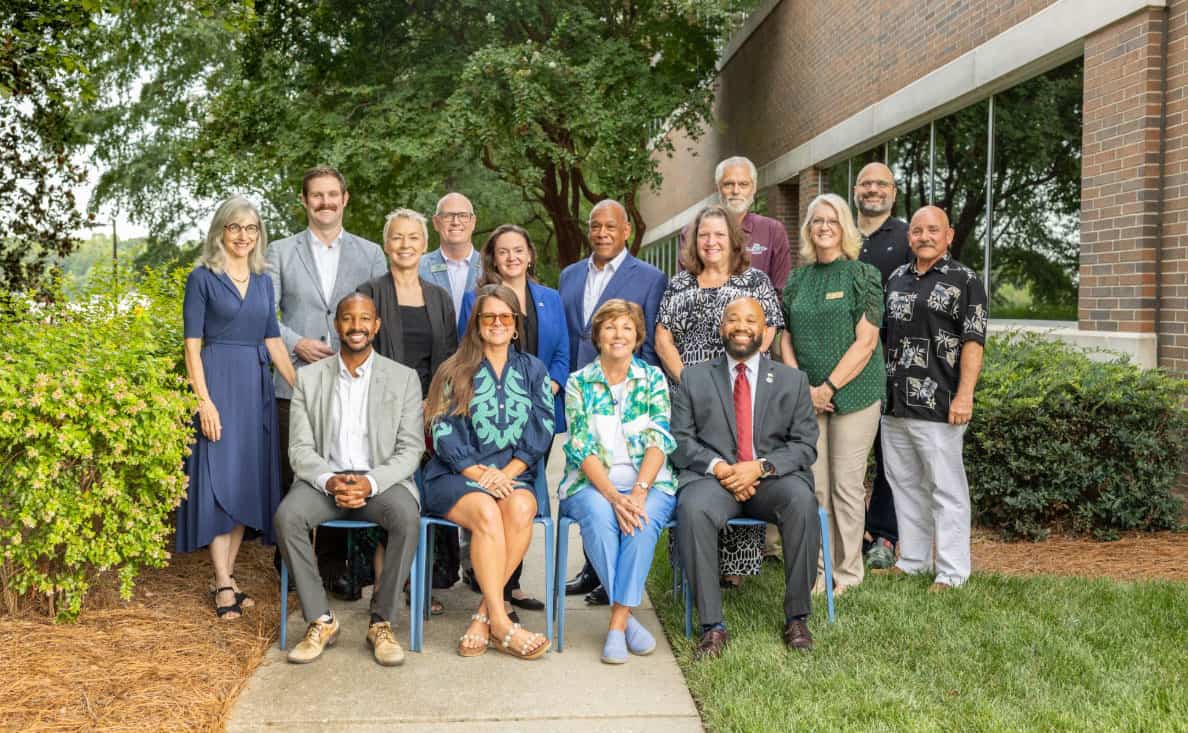 Members of the Central Pines Regional Council Board of Delegates pose outside the Council’s office.