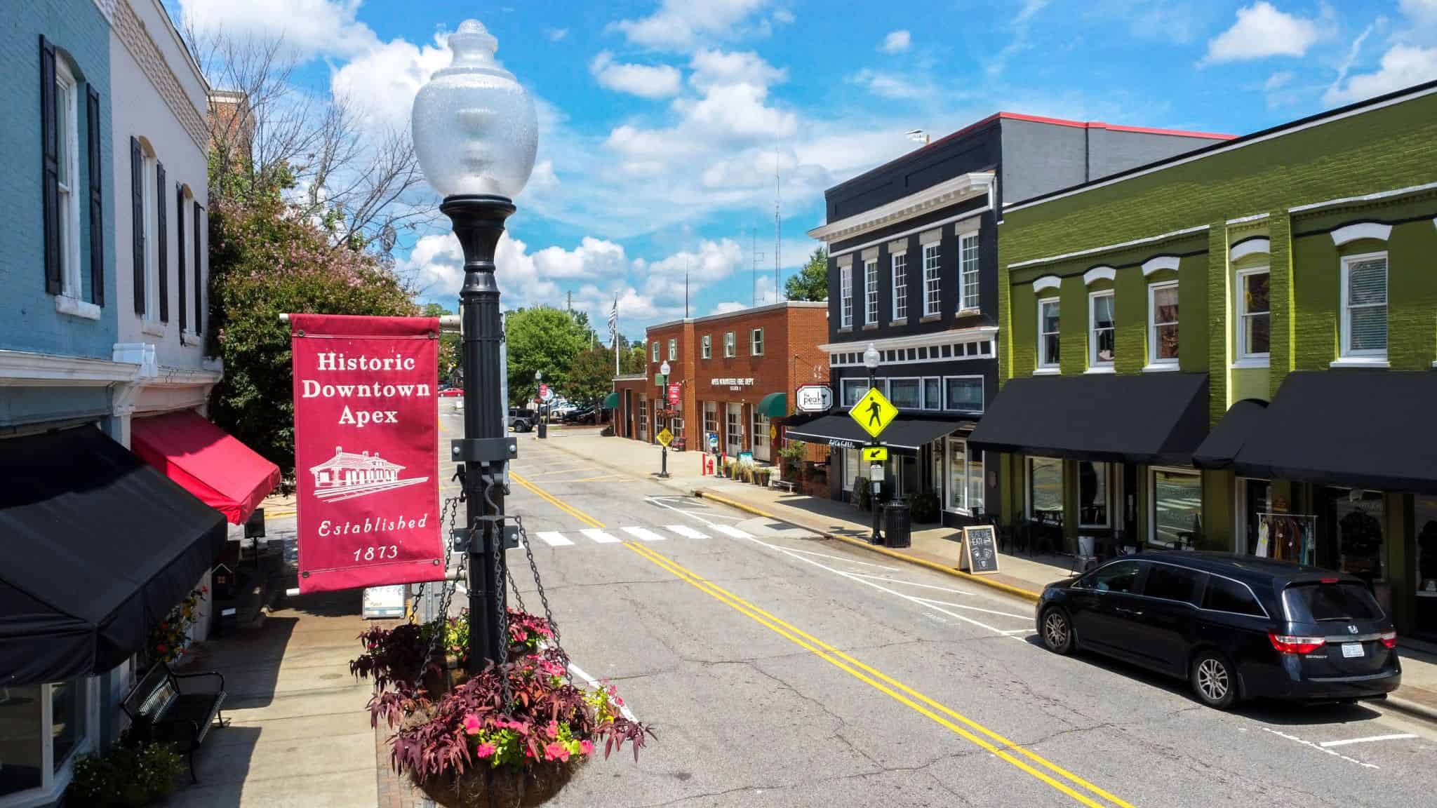 Street view of a downtown area with remodeled buildings lining the street.