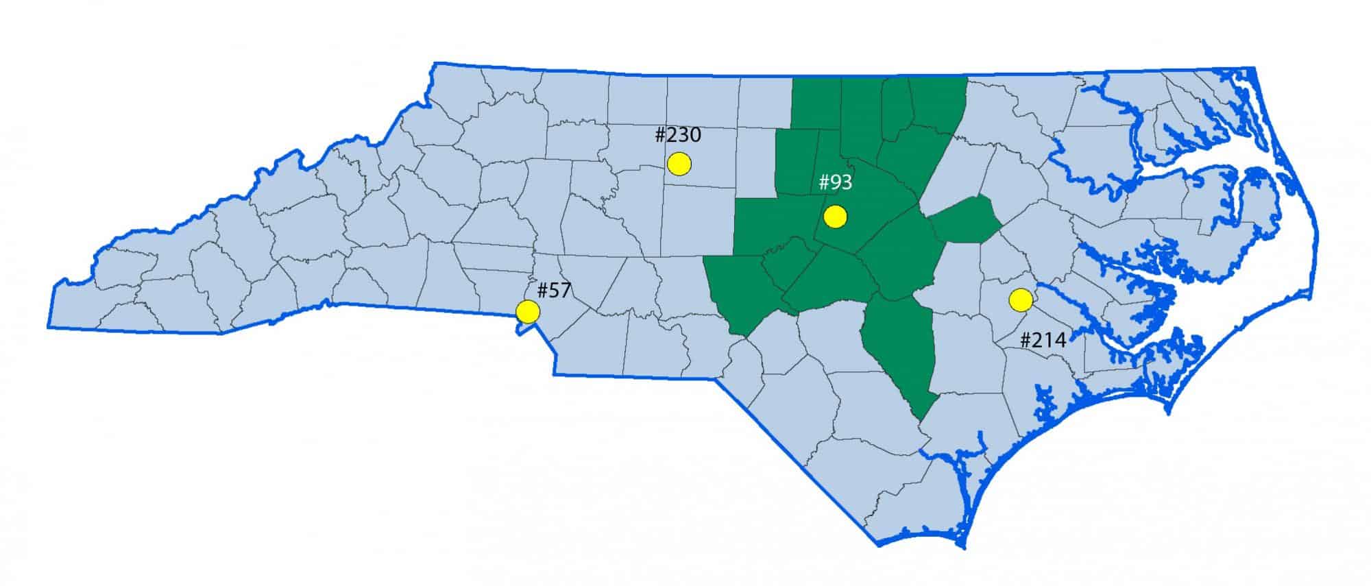 Map of North Carolina with the 15-county Foreign Trade Zone #93 service area highlighted in green and yellow markers for Zones #57, #93, #214 and #230.